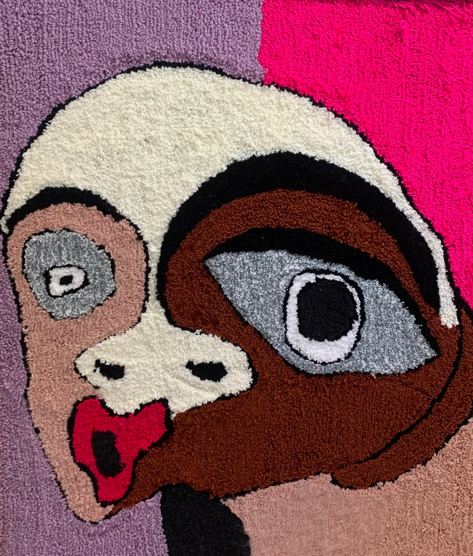 Karel Portrait with a pink, brown and grey textile face